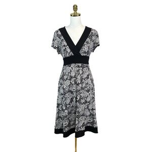 Woman’s Apt. 9 black and white floral stretchy tie back dress size PL